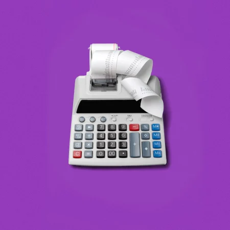 Printing calculator on purple background.